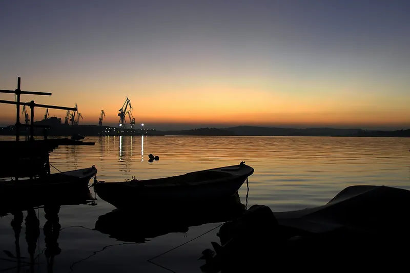 Boats in Pula harbour at sunset
